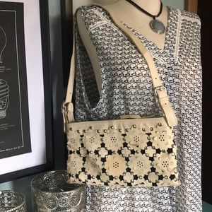 Dan W ivory laser cut floral stud bag